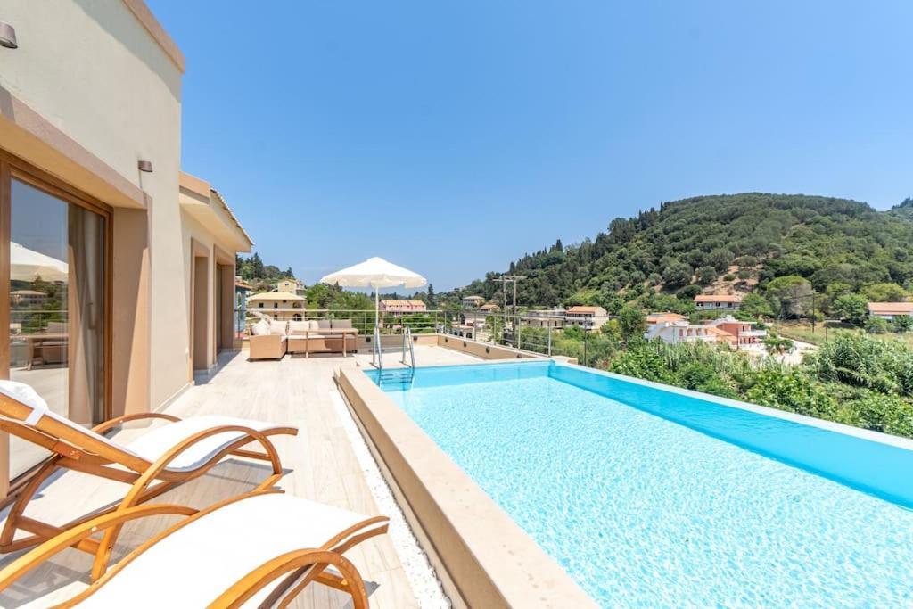 Villa Vasillis-Heated Swimming Pool With Infinity View Vitaládes Buitenkant foto